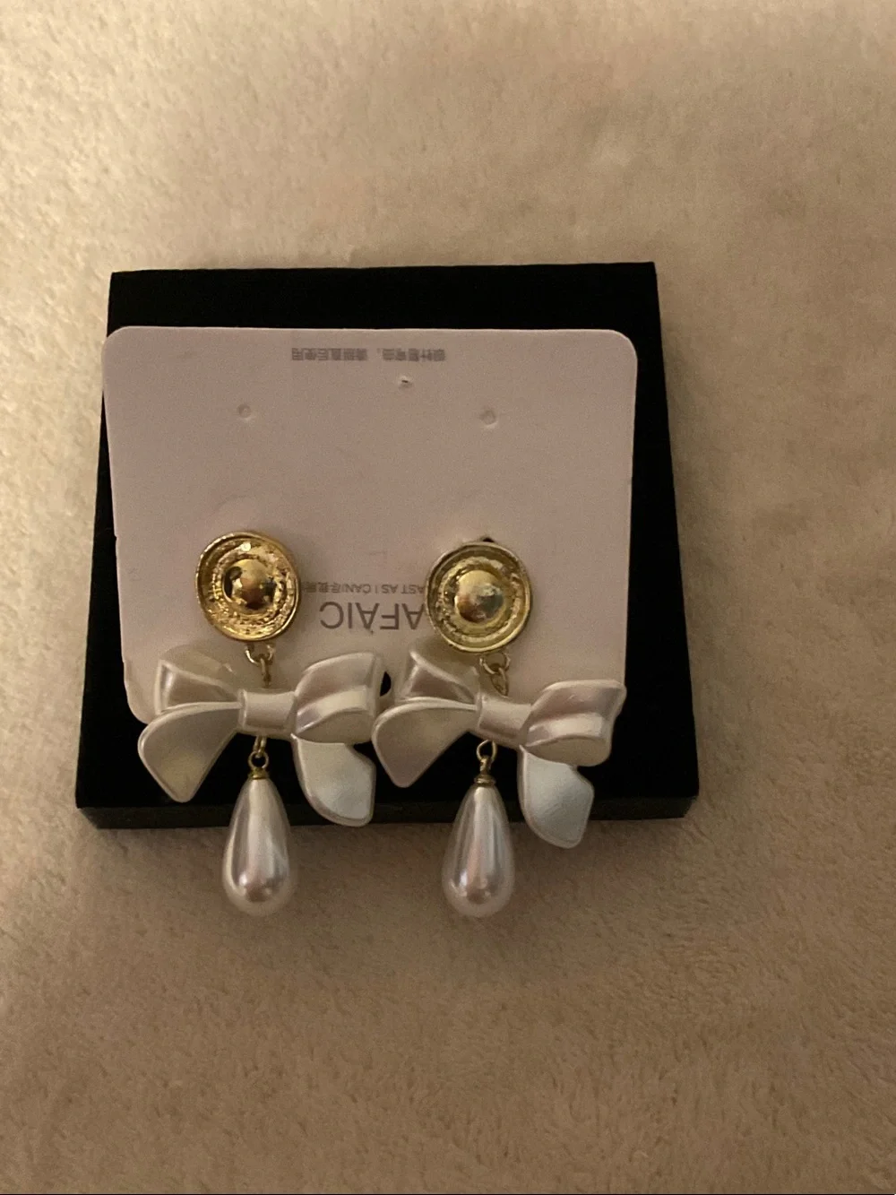 Gold-Tone Bow Earrings with White Pearl Teardrops